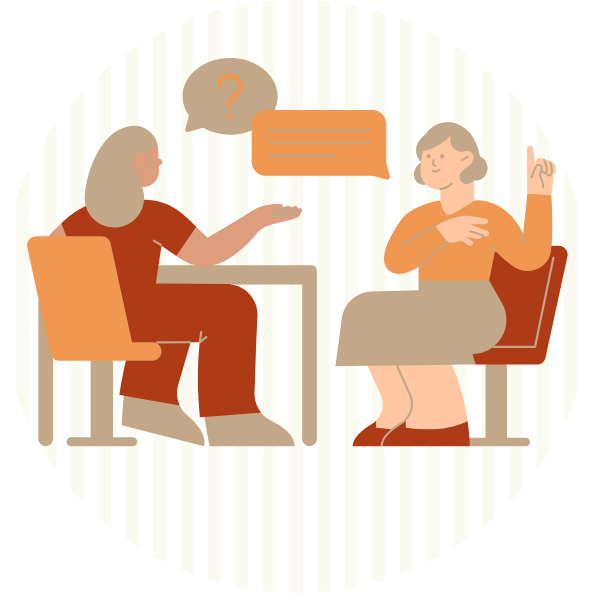 Illustration de deux personnes assises à une table, en pleine discussion, représentant une séance de coaching individuel.